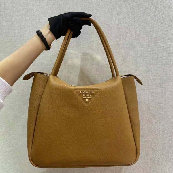 Prada Women Medium Leather Handbag with the Prada Metal Lettering Logo Illuminating Its Center-Brown - Image 2
