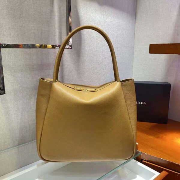 Prada Women Medium Leather Handbag with the Prada Metal Lettering Logo Illuminating Its Center-Brown - Image 4